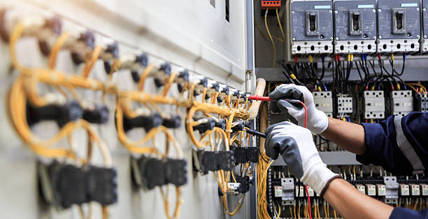 Professional Electrician technician working in Surrey, ND